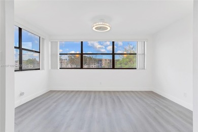 Welcome to this beautifully fully renovated 2nd-floor unit on Sunrise Lakes Phase IV Golf Course in Florida - for sale on GolfHomes.com, golf home, golf lot