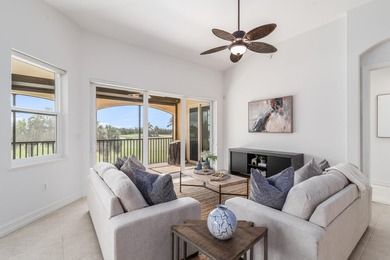 GORGEOUS corner unit - light, bright, and elevated for panoramic on Hammock Bay in Florida - for sale on GolfHomes.com, golf home, golf lot