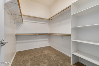 Set on a huge, nearly 12,000-square-foot lot backing to pristine on Estrella Mountain Ranch Golf Course in Arizona - for sale on GolfHomes.com, golf home, golf lot