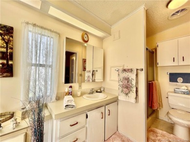 Charming 2/2 home filled with love. Enjoy the spacious front on Indianwood Golf and Country Club in Florida - for sale on GolfHomes.com, golf home, golf lot