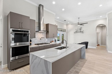 Beautifully Updated 4-Bedroom Pool Home in Gated Baytree! This on Baytree National Golf Links in Florida - for sale on GolfHomes.com, golf home, golf lot