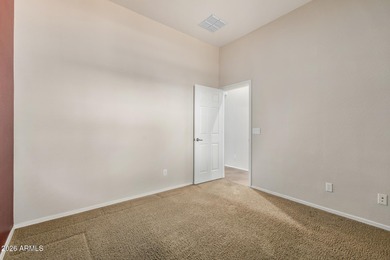 Set on a huge, nearly 12,000-square-foot lot backing to pristine on Estrella Mountain Ranch Golf Course in Arizona - for sale on GolfHomes.com, golf home, golf lot