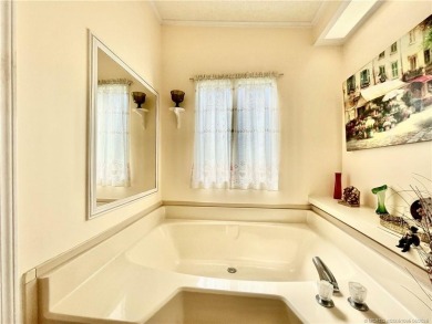 Charming 2/2 home filled with love. Enjoy the spacious front on Indianwood Golf and Country Club in Florida - for sale on GolfHomes.com, golf home, golf lot