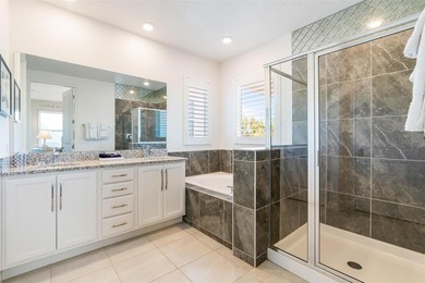 Discover an extraordinary opportunity with this exquisitely on Reunion Resort Golf Course in Florida - for sale on GolfHomes.com, golf home, golf lot