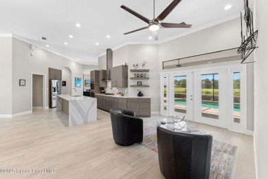 Beautifully Updated 4-Bedroom Pool Home in Gated Baytree! This on Baytree National Golf Links in Florida - for sale on GolfHomes.com, golf home, golf lot