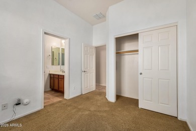 Set on a huge, nearly 12,000-square-foot lot backing to pristine on Estrella Mountain Ranch Golf Course in Arizona - for sale on GolfHomes.com, golf home, golf lot