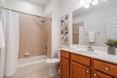 GORGEOUS corner unit - light, bright, and elevated for panoramic on Hammock Bay in Florida - for sale on GolfHomes.com, golf home, golf lot