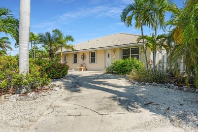 Paradise awaits! Welcome to your 3 bedroom 2 bath dream home in on Key Colony Beach Golf Course in Florida - for sale on GolfHomes.com, golf home, golf lot