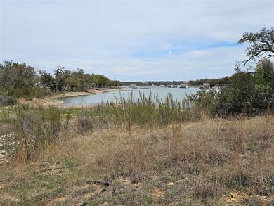 Build your dream home on this beautiful half-acre waterfront lot on Hideout Golf Club and Resort  in Texas - for sale on GolfHomes.com, golf home, golf lot