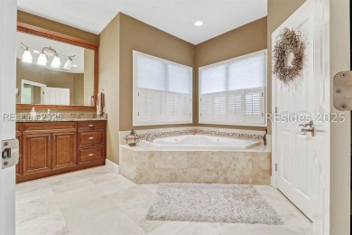 Welcome to this beautifully maintained 4-bedroom, 4-bathroom on Long Cove Club in South Carolina - for sale on GolfHomes.com, golf home, golf lot