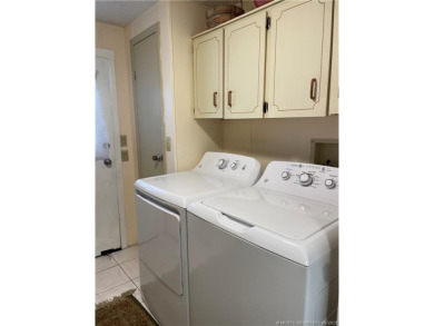 Charming 2/2 home filled with love. Enjoy the spacious front on Indianwood Golf and Country Club in Florida - for sale on GolfHomes.com, golf home, golf lot
