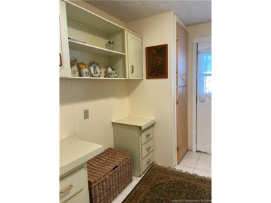 Charming 2/2 home filled with love. Enjoy the spacious front on Indianwood Golf and Country Club in Florida - for sale on GolfHomes.com, golf home, golf lot