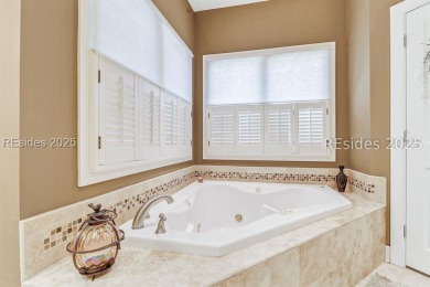 Welcome to this beautifully maintained 4-bedroom, 4-bathroom on Long Cove Club in South Carolina - for sale on GolfHomes.com, golf home, golf lot