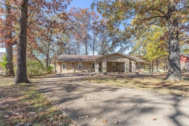 This stunning 4-bedroom, 2-bathroom home is perfectly situated on Ozark Ridge Golf Course in Missouri - for sale on GolfHomes.com, golf home, golf lot