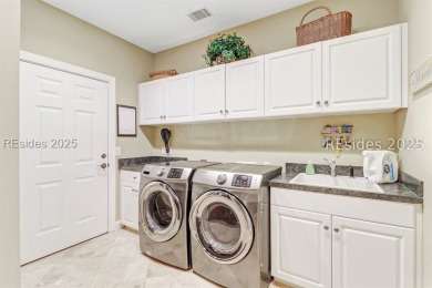 Welcome to this beautifully maintained 4-bedroom, 4-bathroom on Long Cove Club in South Carolina - for sale on GolfHomes.com, golf home, golf lot
