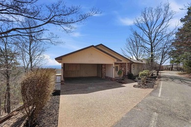 Wake up to breathtaking lake & mountain views, where every on Indian Hills Country Club in Arkansas - for sale on GolfHomes.com, golf home, golf lot