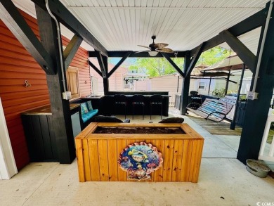 NEW LISTING! STUNNING 3 BED/2 BATH RAISED BEACH HOUSE WITH TONS on Prestwick Country Club in South Carolina - for sale on GolfHomes.com, golf home, golf lot