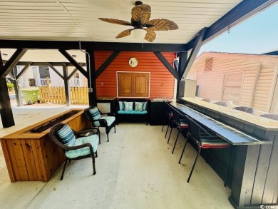 NEW LISTING! STUNNING 3 BED/2 BATH RAISED BEACH HOUSE WITH TONS on Prestwick Country Club in South Carolina - for sale on GolfHomes.com, golf home, golf lot