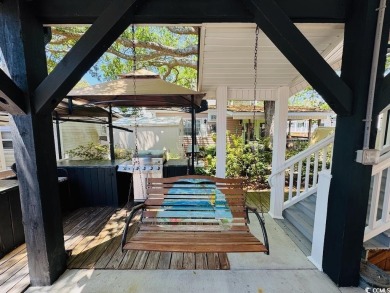 NEW LISTING! STUNNING 3 BED/2 BATH RAISED BEACH HOUSE WITH TONS on Prestwick Country Club in South Carolina - for sale on GolfHomes.com, golf home, golf lot