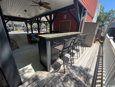NEW LISTING! STUNNING 3 BED/2 BATH RAISED BEACH HOUSE WITH TONS on Prestwick Country Club in South Carolina - for sale on GolfHomes.com, golf home, golf lot