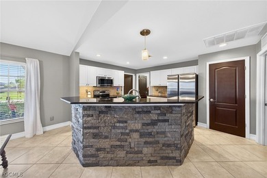 No flood insurance required - This private Florida retreat is on Burnt Store Golf Club in Florida - for sale on GolfHomes.com, golf home, golf lot