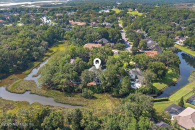 GORGEOUS MARSH VIEW CUL-DE-SAC HOME IN THE GATED GOLF AND on Queens Harbour Yacht and Country Club in Florida - for sale on GolfHomes.com, golf home, golf lot