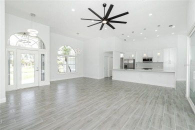 Immaculate Lakefront Pool Home in Prestigious Burnt Store Isles on Twin Isles Country Club in Florida - for sale on GolfHomes.com, golf home, golf lot