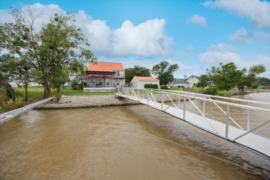 This beautiful lakefront home boasts of 2,605 sf of space on The Club At Runaway Bay in Texas - for sale on GolfHomes.com, golf home, golf lot