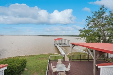 This beautiful lakefront home boasts of 2,605 sf of space on The Club At Runaway Bay in Texas - for sale on GolfHomes.com, golf home, golf lot