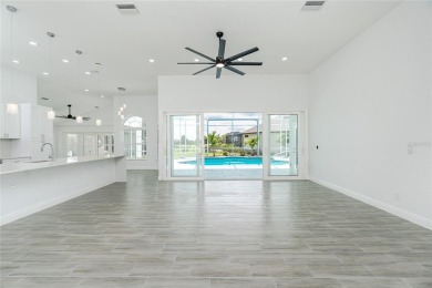 Immaculate Lakefront Pool Home in Prestigious Burnt Store Isles on Twin Isles Country Club in Florida - for sale on GolfHomes.com, golf home, golf lot