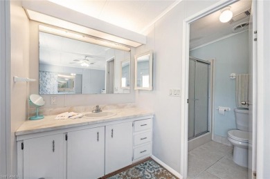 This stylish 2BR/2BA home features a spacious 240 s/f glass on Riviera Golf Club in Florida - for sale on GolfHomes.com, golf home, golf lot