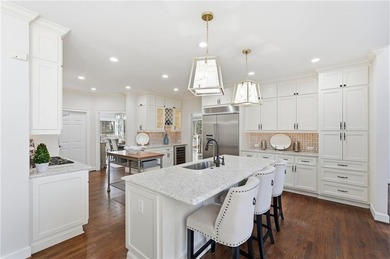 Discover an exceptional home in the highly sought-after, gated on Alpharetta Athletic Club East in Georgia - for sale on GolfHomes.com, golf home, golf lot