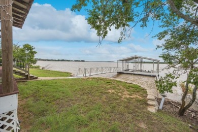 This beautiful lakefront home boasts of 2,605 sf of space on The Club At Runaway Bay in Texas - for sale on GolfHomes.com, golf home, golf lot