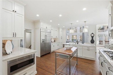 Discover an exceptional home in the highly sought-after, gated on Alpharetta Athletic Club East in Georgia - for sale on GolfHomes.com, golf home, golf lot