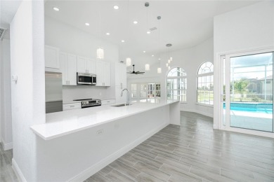 Immaculate Lakefront Pool Home in Prestigious Burnt Store Isles on Twin Isles Country Club in Florida - for sale on GolfHomes.com, golf home, golf lot