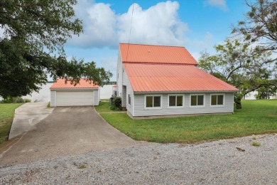 This beautiful lakefront home boasts of 2,605 sf of space on The Club At Runaway Bay in Texas - for sale on GolfHomes.com, golf home, golf lot