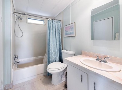 This stylish 2BR/2BA home features a spacious 240 s/f glass on Riviera Golf Club in Florida - for sale on GolfHomes.com, golf home, golf lot