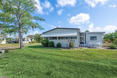 This stylish 2BR/2BA home features a spacious 240 s/f glass on Riviera Golf Club in Florida - for sale on GolfHomes.com, golf home, golf lot