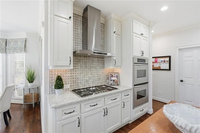 Discover an exceptional home in the highly sought-after, gated on Alpharetta Athletic Club East in Georgia - for sale on GolfHomes.com, golf home, golf lot