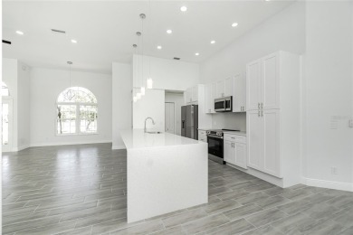 Immaculate Lakefront Pool Home in Prestigious Burnt Store Isles on Twin Isles Country Club in Florida - for sale on GolfHomes.com, golf home, golf lot