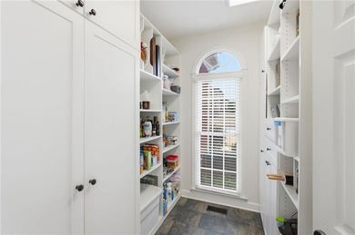 Discover an exceptional home in the highly sought-after, gated on Alpharetta Athletic Club East in Georgia - for sale on GolfHomes.com, golf home, golf lot