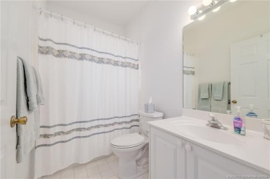 Villa for sale, first floor furnished villa with 2 bedrooms, den on Santa Lucia River Club in Florida - for sale on GolfHomes.com, golf home, golf lot