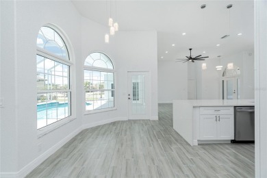 Immaculate Lakefront Pool Home in Prestigious Burnt Store Isles on Twin Isles Country Club in Florida - for sale on GolfHomes.com, golf home, golf lot
