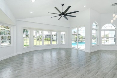 Immaculate Lakefront Pool Home in Prestigious Burnt Store Isles on Twin Isles Country Club in Florida - for sale on GolfHomes.com, golf home, golf lot