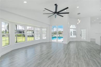 Immaculate Lakefront Pool Home in Prestigious Burnt Store Isles on Twin Isles Country Club in Florida - for sale on GolfHomes.com, golf home, golf lot
