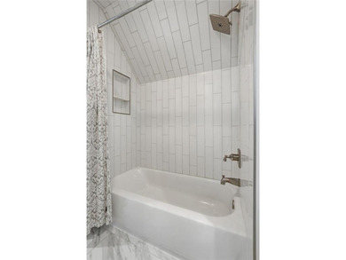 Discover an exceptional home in the highly sought-after, gated on Alpharetta Athletic Club East in Georgia - for sale on GolfHomes.com, golf home, golf lot