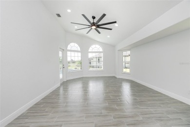 Immaculate Lakefront Pool Home in Prestigious Burnt Store Isles on Twin Isles Country Club in Florida - for sale on GolfHomes.com, golf home, golf lot