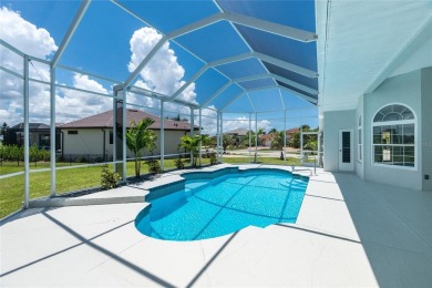 Immaculate Lakefront Pool Home in Prestigious Burnt Store Isles on Twin Isles Country Club in Florida - for sale on GolfHomes.com, golf home, golf lot