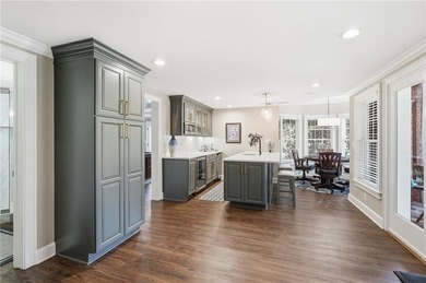 Discover an exceptional home in the highly sought-after, gated on Alpharetta Athletic Club East in Georgia - for sale on GolfHomes.com, golf home, golf lot