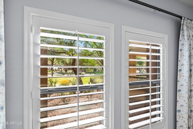 Stunning first-floor corner unit in the Bella Monte, gated, golf on Wildfire Golf Club in Arizona - for sale on GolfHomes.com, golf home, golf lot